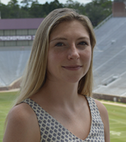 Headshot of a woman on college campus